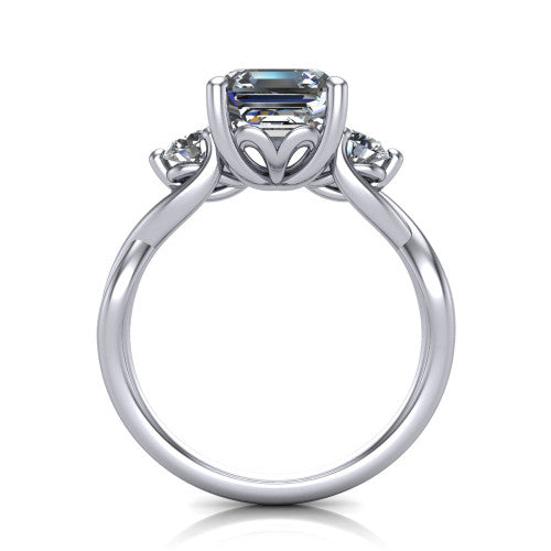 Lydia square emerald three stone engagement ring in 14K White Gold, through-finger front profile showing the three-stone head, floral filigree under-gallery, and woven shank