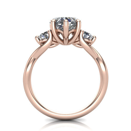 Lydia heart three stone engagement ring in 18K Rose Gold, through-finger front profile showing the three-stone head, floral filigree under-gallery, and woven shank