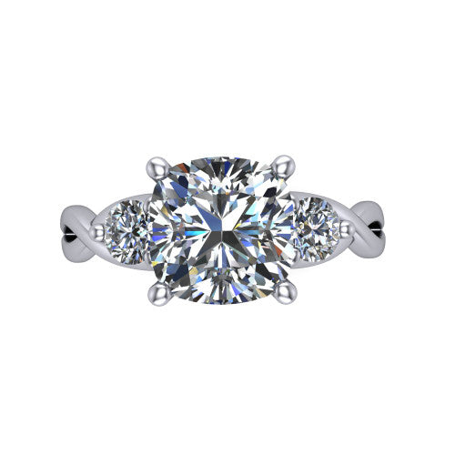 Lydia cushion three stone engagement ring in Platinum, top-down view showing the brilliant cushion-cut center diamond with two matched round side diamonds