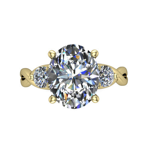 Lydia oval three stone engagement ring in 18K Yellow Gold, top-down view showing the brilliant oval center diamond with two matched round side diamonds