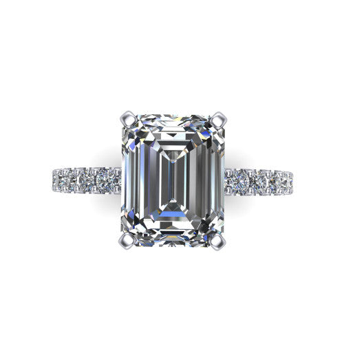 Elizabeth emerald solitaire engagement ring in Platinum, top-down view showing the step-cut emerald center diamond held by four prongs above the pave band