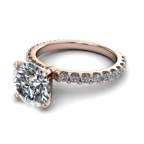 Elizabeth round solitaire engagement ring in 14K Rose Gold, three-quarter perspective showing the brilliant round center diamond on a French-pave eternity diamond band