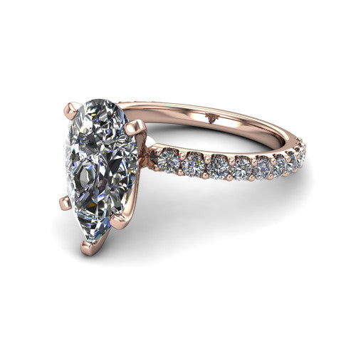 Elizabeth pear solitaire engagement ring in 14K Rose Gold, three-quarter perspective showing the brilliant pear-cut center diamond on a French-pave eternity diamond band