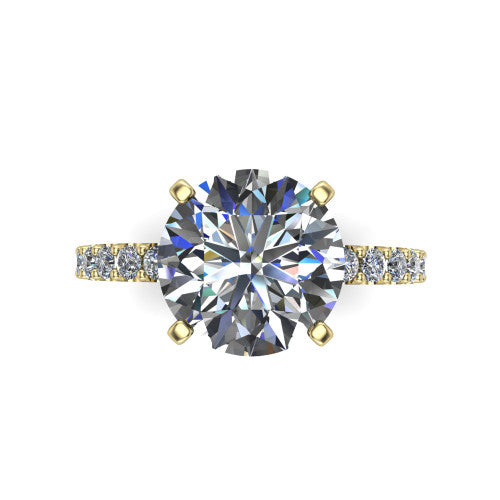 Elizabeth round solitaire engagement ring in 18K Yellow Gold, top-down view showing the brilliant round center diamond held by four prongs above the pave band