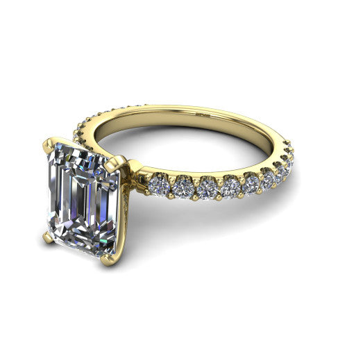 Elizabeth emerald solitaire engagement ring in 14K Yellow Gold, three-quarter perspective showing the step-cut emerald center diamond on a French-pave eternity diamond band