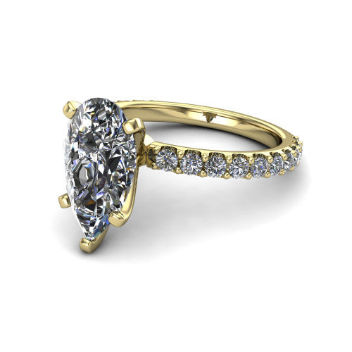 Elizabeth pear solitaire engagement ring in 14K Yellow Gold, three-quarter perspective showing the brilliant pear-cut center diamond on a French-pave eternity diamond band