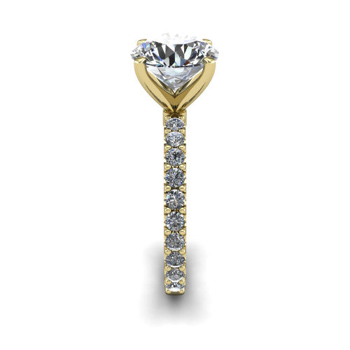 Elizabeth round solitaire engagement ring in 14K Yellow Gold, side profile showing the pave diamonds running continuously around the shank