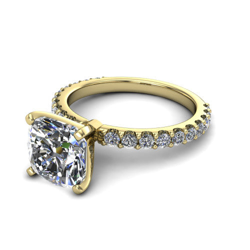 Elizabeth cushion solitaire engagement ring in 18K Yellow Gold, three-quarter perspective showing the brilliant cushion-cut center diamond on a French-pave eternity diamond band