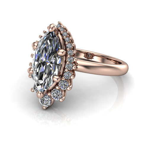 Matilda marquise halo engagement ring in 18K Rose Gold, three-quarter perspective showing the brilliant marquise center diamond inside a sunburst halo of pointed rays with round accent diamonds clustered between them