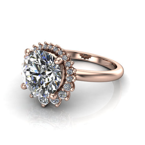 Matilda round halo engagement ring in 14K Rose Gold, three-quarter perspective showing the brilliant round center diamond inside a sunburst halo of pointed rays with round accent diamonds clustered between them