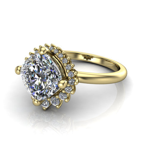 Matilda cushion halo engagement ring in 14K Yellow Gold, three-quarter perspective showing the brilliant cushion-cut center diamond inside a sunburst halo of pointed rays with round accent diamonds clustered between them