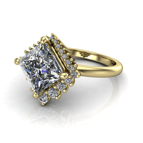 Matilda princess halo engagement ring in 18K Yellow Gold, three-quarter perspective showing the kite-set brilliant princess center diamond inside a sunburst halo of pointed rays with round accent diamonds clustered between them