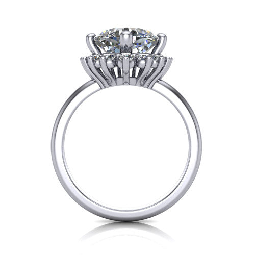 Matilda cushion halo engagement ring in Platinum, through-finger front profile showing the sunburst halo head and tall crown cathedral basket