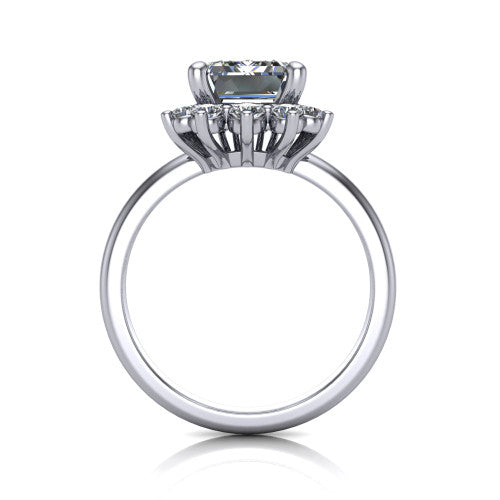 Matilda emerald halo engagement ring in Platinum, through-finger front profile showing the sunburst halo head and tall crown cathedral basket