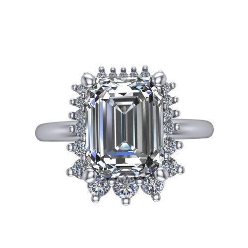 Matilda emerald halo engagement ring in 18K White Gold, top-down view showing the step-cut emerald center diamond surrounded by sunburst rays and clusters of small round accent diamonds