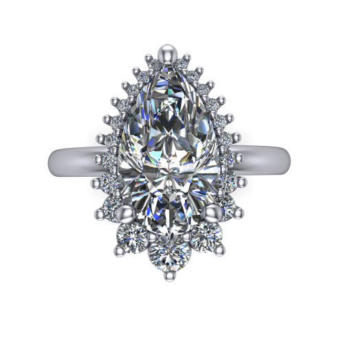 Matilda pear halo engagement ring in 18K White Gold, top-down view showing the brilliant pear-cut center diamond surrounded by sunburst rays and clusters of small round accent diamonds