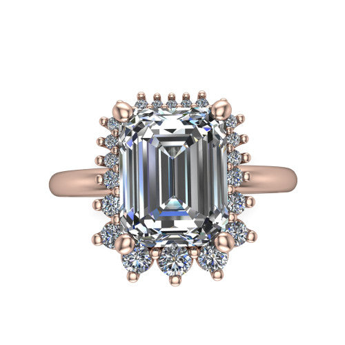 Matilda emerald halo engagement ring in 18K Rose Gold, top-down view showing the step-cut emerald center diamond surrounded by sunburst rays and clusters of small round accent diamonds