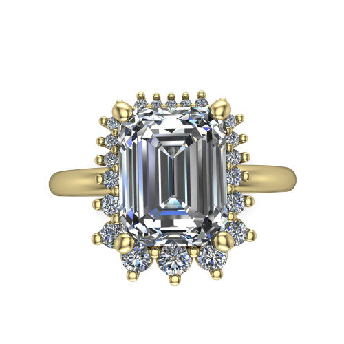 Matilda emerald halo engagement ring in 14K Yellow Gold, top-down view showing the step-cut emerald center diamond surrounded by sunburst rays and clusters of small round accent diamonds