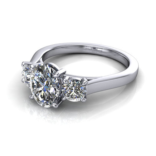 Olivia oval three stone engagement ring in 14K White Gold, three-quarter perspective showing the brilliant oval center diamond flanked by two round side diamonds on a squared flat-top shank