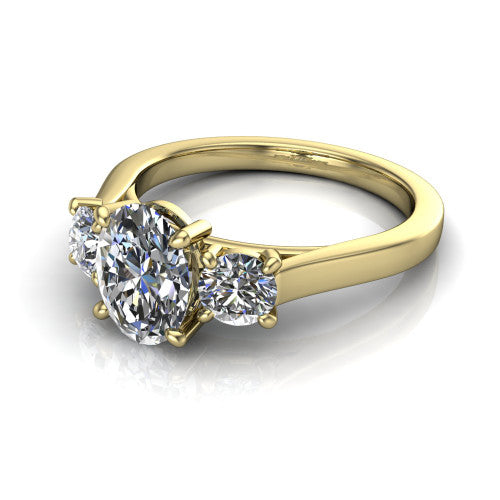 Olivia oval three stone engagement ring in 14K Yellow Gold, three-quarter perspective showing the brilliant oval center diamond flanked by two round side diamonds on a squared flat-top shank