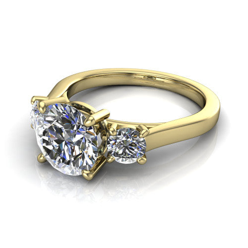 Olivia round three stone engagement ring in 14K Yellow Gold, three-quarter perspective showing the brilliant round center diamond flanked by two round side diamonds on a squared flat-top shank