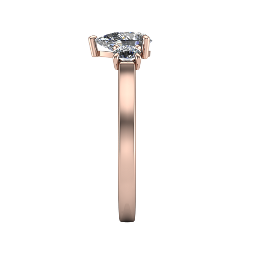 Olivia pear three stone engagement ring in 18K Rose Gold, side profile showing the squared flat-top shank and three-stone head