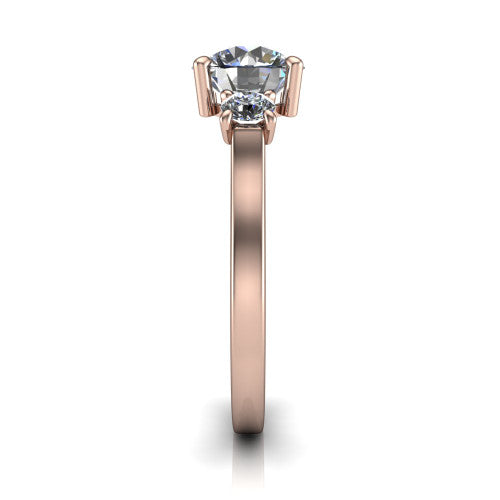 Olivia round three stone engagement ring in 18K Rose Gold, side profile showing the squared flat-top shank and three-stone head