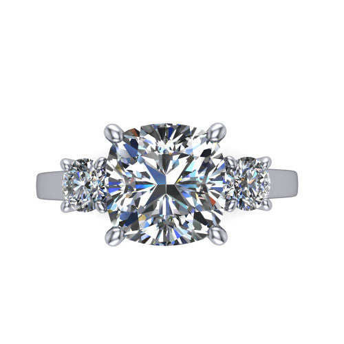 Olivia cushion three stone engagement ring in Platinum, top-down view showing the brilliant cushion-cut center diamond with two matched round side diamonds