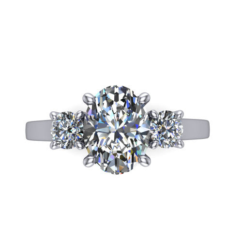 Olivia oval three stone engagement ring in 18K White Gold, top-down view showing the brilliant oval center diamond with two matched round side diamonds