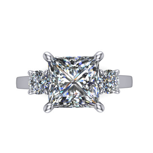 Olivia princess three stone engagement ring in Platinum, top-down view showing the brilliant princess-cut center diamond with two matched round side diamonds