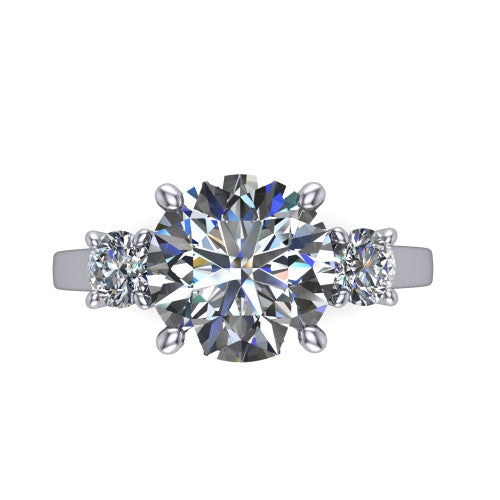 Olivia round three stone engagement ring in 18K White Gold, top-down view showing the brilliant round center diamond with two matched round side diamonds