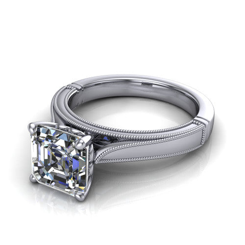 Adeline square emerald solitaire engagement ring in 18K White Gold, three-quarter perspective showing the step-cut square emerald center diamond on a wide flat-top milgrain band