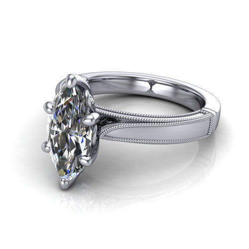 Adeline marquise solitaire engagement ring in 14K White Gold, three-quarter perspective showing the brilliant marquise center diamond on a wide flat-top milgrain band