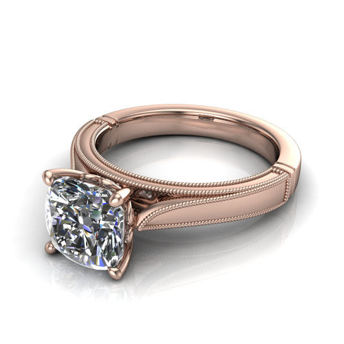Adeline cushion solitaire engagement ring in 18K Rose Gold, three-quarter perspective showing the brilliant cushion-cut center diamond on a wide flat-top milgrain band