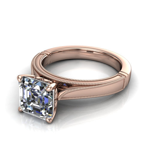 Adeline square emerald solitaire engagement ring in 14K Rose Gold, three-quarter perspective showing the step-cut square emerald center diamond on a wide flat-top milgrain band