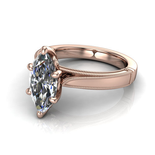 Adeline marquise solitaire engagement ring in 18K Rose Gold, three-quarter perspective showing the brilliant marquise center diamond on a wide flat-top milgrain band