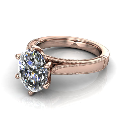 Adeline oval solitaire engagement ring in 14K Rose Gold, three-quarter perspective showing the brilliant oval center diamond on a wide flat-top milgrain band