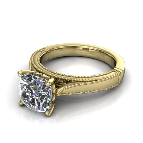 Adeline cushion solitaire engagement ring in 14K Yellow Gold, three-quarter perspective showing the brilliant cushion-cut center diamond on a wide flat-top milgrain band