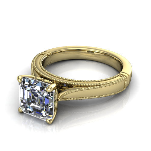 Adeline square emerald solitaire engagement ring in 14K Yellow Gold, three-quarter perspective showing the step-cut square emerald center diamond on a wide flat-top milgrain band