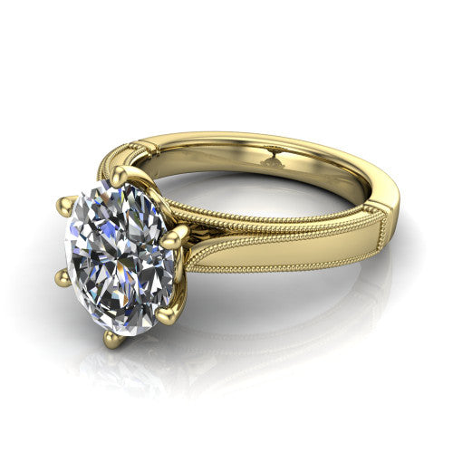 Adeline oval solitaire engagement ring in 18K Yellow Gold, three-quarter perspective showing the brilliant oval center diamond on a wide flat-top milgrain band