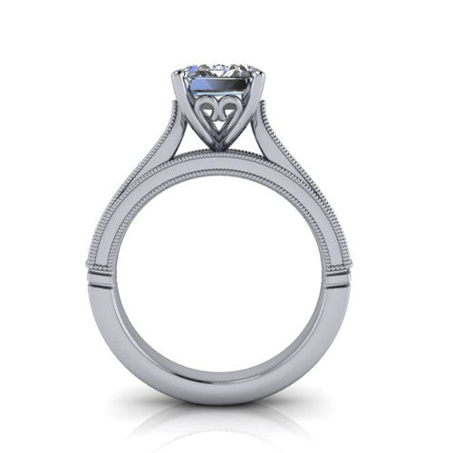 Adeline emerald solitaire engagement ring in 14K White Gold, through-finger front profile showing the heart filigree under-gallery and milgrain band edges