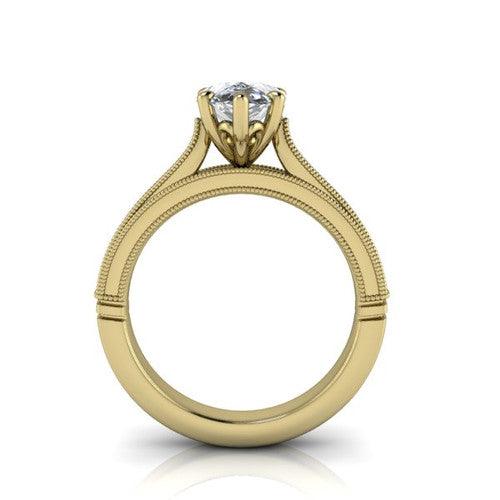 Adeline pear solitaire engagement ring in 18K Yellow Gold, through-finger front profile showing the heart filigree under-gallery and milgrain band edges