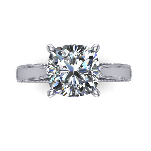 Adeline cushion solitaire engagement ring in 18K White Gold, top-down view showing the brilliant cushion-cut center diamond held by four prongs above a squared milgrain band