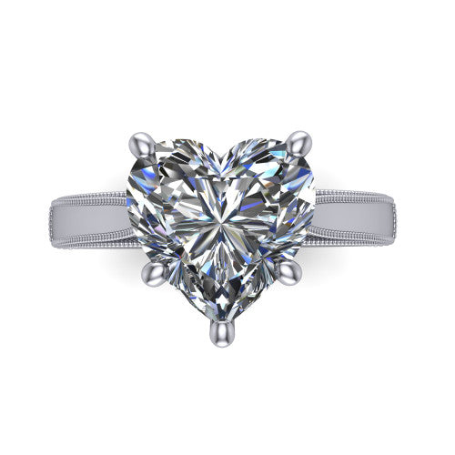 Adeline heart solitaire engagement ring in 14K White Gold, top-down view showing the brilliant heart-shaped center diamond held by four prongs above a squared milgrain band