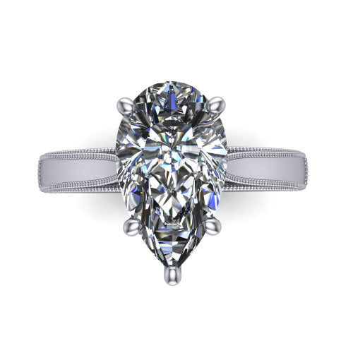 Adeline pear solitaire engagement ring in Platinum, top-down view showing the brilliant pear-cut center diamond held by four prongs above a squared milgrain band