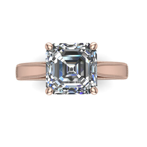 Adeline square emerald solitaire engagement ring in 14K Rose Gold, top-down view showing the step-cut square emerald center diamond held by four prongs above a squared milgrain band