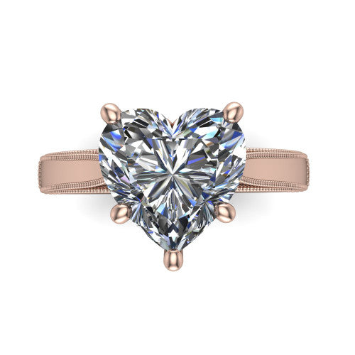 Adeline heart solitaire engagement ring in 18K Rose Gold, top-down view showing the brilliant heart-shaped center diamond held by four prongs above a squared milgrain band