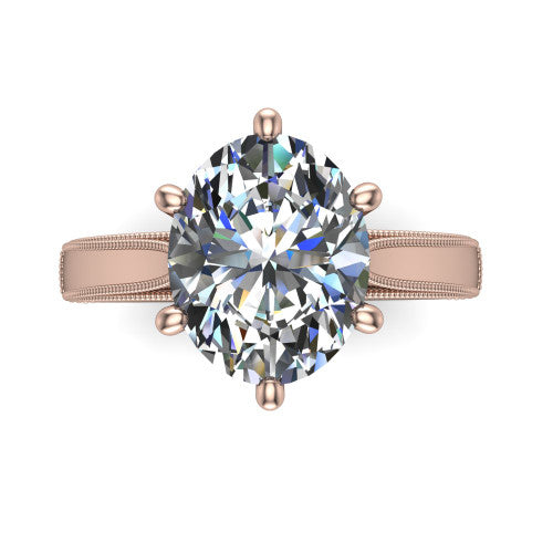 Adeline oval solitaire engagement ring in 14K Rose Gold, top-down view showing the brilliant oval center diamond held by four prongs above a squared milgrain band