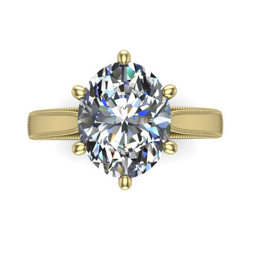 Adeline oval solitaire engagement ring in 18K Yellow Gold, top-down view showing the brilliant oval center diamond held by four prongs above a squared milgrain band