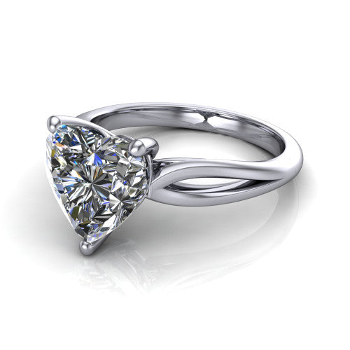 Beatrice heart solitaire engagement ring in 14K White Gold, three-quarter perspective showing the brilliant heart-shaped center diamond on a slim polished band with trellis crossover gallery